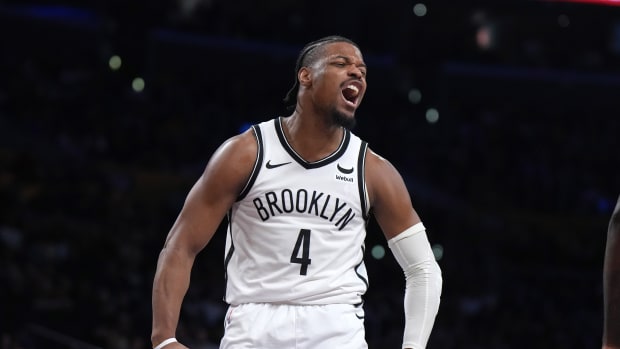 Brooklyn Nets guard Dennis Smith Jr. (4) celebrates against the Los Angeles Lakers